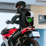 Gelrova LED Motorcycle Backpack - Rampage Series, customizable display, worn by rider on sport bike.