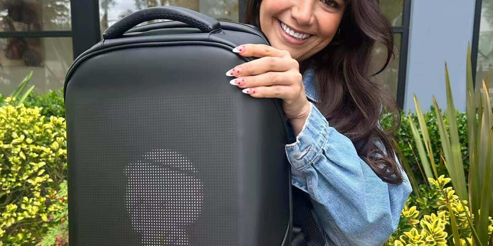From Commute to Festival: How the Gelrova LED Backpack Lights Up Your City Life - stylish user showcasing LED backpack.
