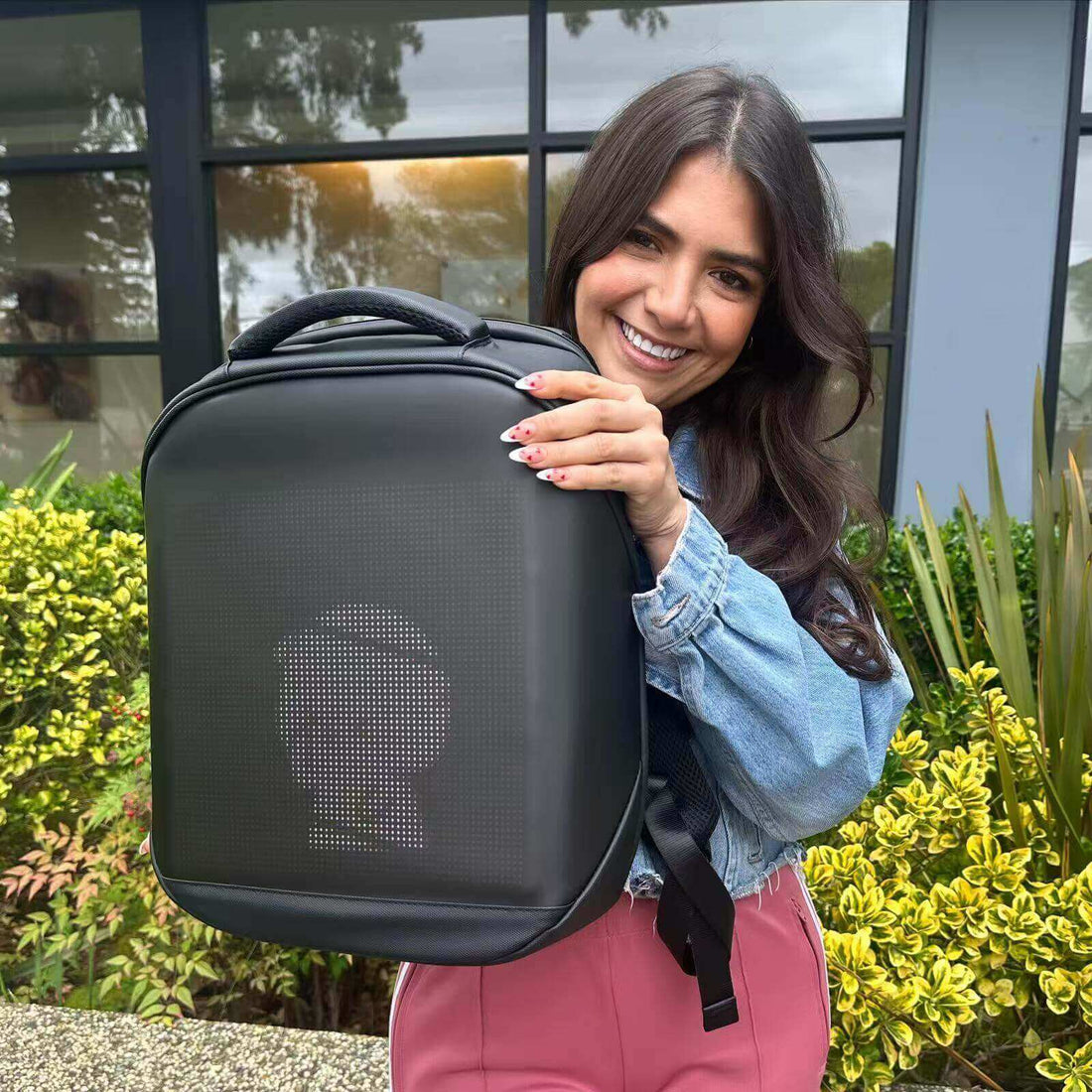 From Commute to Festival: How the Gelrova LED Backpack Lights Up Your City Life - stylish user showcasing LED backpack.