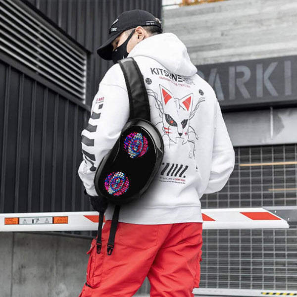 Young adult wearing Gelrova LED Crossbody Bag with animated eyes, showcasing its stylish and tech-savvy design.
