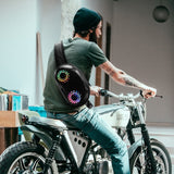 Man wearing Gelrova LED Crossbody Bag with colorful patterns on a motorcycle, showcasing stylish tech and everyday utility.