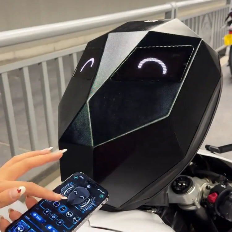 A rider using smartphone app to control the Gelrova Knight LED motorcycle backpack mounted on the bike seat.