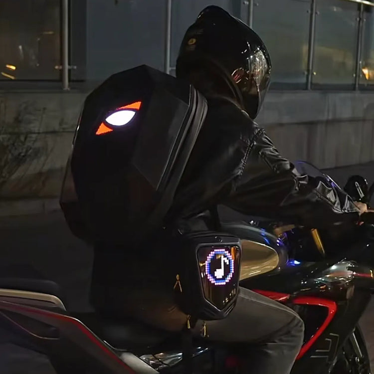 A motorcycle rider driving at night wearing the Gelrova LED Pixel Art Leg Bag displaying a glowing music note, perfectly paired with the Gelrova Devil Eye LED backpack.