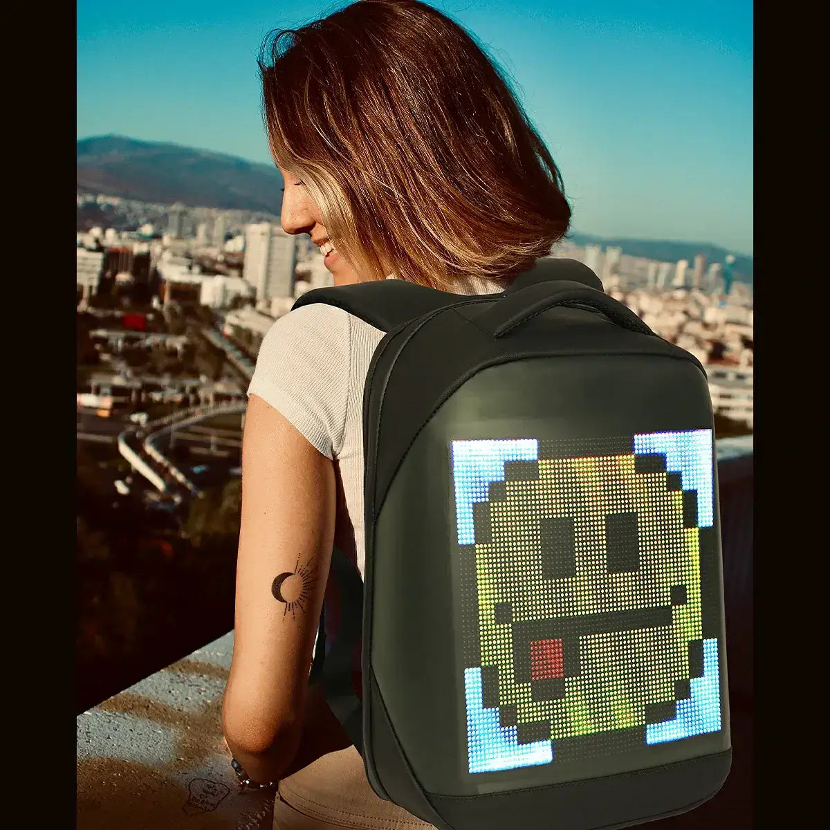 Girl hiking with Gelrova City Series LED backpack displaying customizable LED design