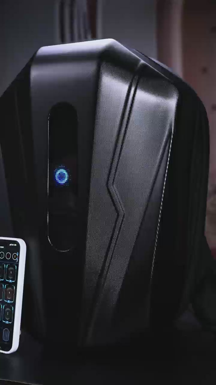 A close-up of the Gelrova Evolution LED Motorcycle Backpack, demonstrating its unique vertical pill-shaped screen being controlled by a smartphone app to display glowing blue spirals and a red devil eye.