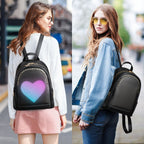 A woman carrying the T5 Women’s LED Backpack, with the screen on the backpack displaying a heart